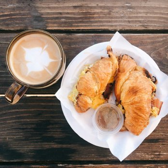 Breakfast croissant and a latte